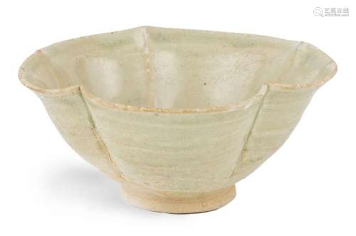 A Chinese celadon foliate bowl, Song dynasty, raised on shor...