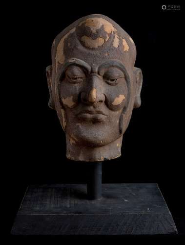 A Chinese clay head of a Luohan, Yuan/Ming dynasty, modelled...