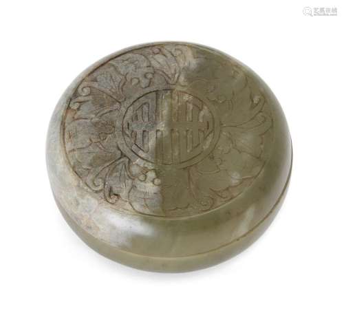 A Chinese green hardstone circular box and cover, early 20th...