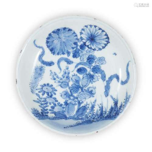 A Chinese blue and white saucer dish, Kangxi period, painted...