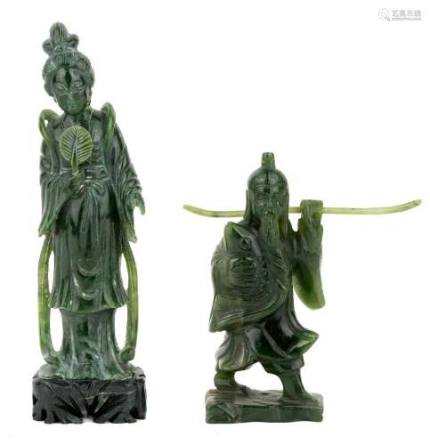 Two Chinese figurative green hard stone carvings, 20th centu...