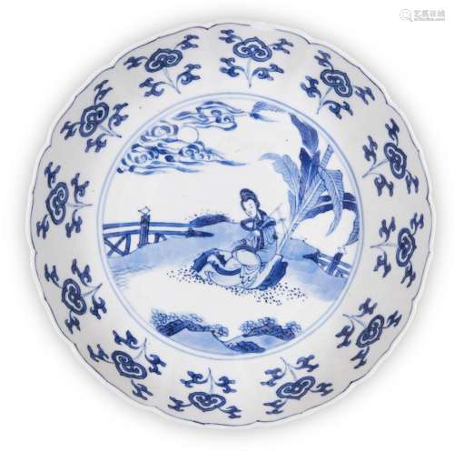 A Chinese blue and white dish, Kangxi period, painted to the...