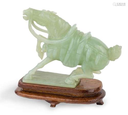 A Chinese hardstone carved horse, Republic period, carved as...