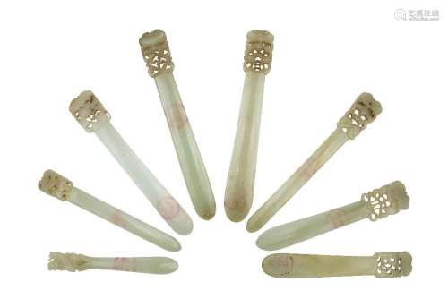 Eight Chinese pale celadon jade hairpins, 19th century, each...