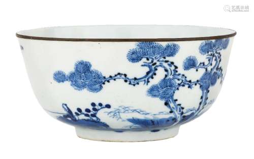 A Chinese blue and white bowl, 18th century, rim mounted wit...