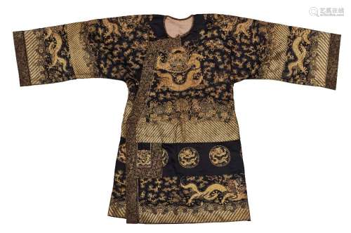 A Chinese black silk gold and silver thread-embroidered modi...