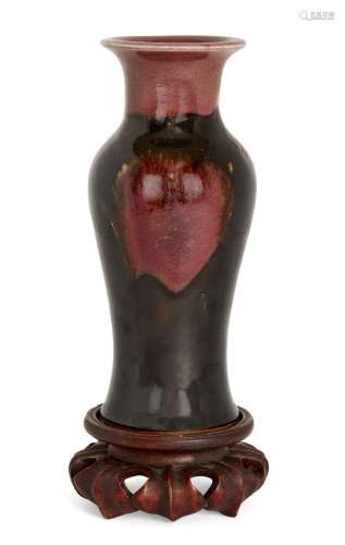 A Chinese flambé-glazed vase, 19th century, of tapered form ...