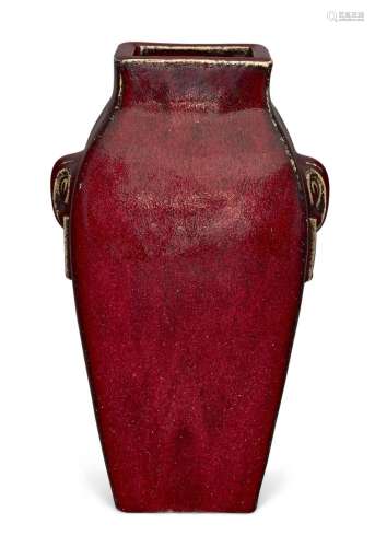 A Chinese archaistic monochrome copper red vase, late Qing d...