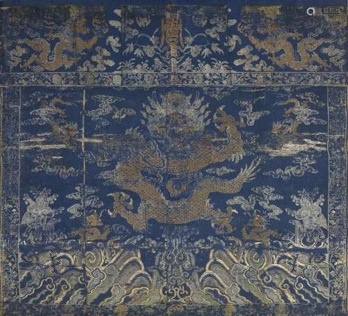 A large Chinese silk blue ground brocade ‘dragon’ panel, 18t...