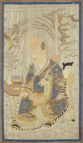 A Chinese gold thread and silk-embroidered panel of Shoulao ...