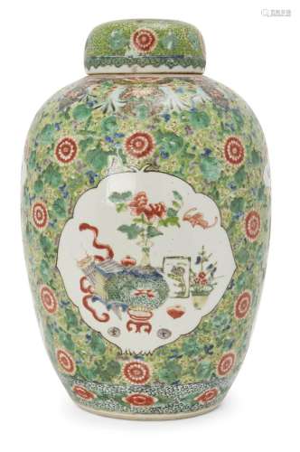A large Chinese famille verte 'hundred treasures' jar and co...
