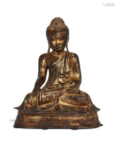 A large Burmese gilt-lacquered bronze figure of Shakyamuni B...