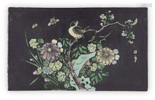A Chinese black ground famille verte biscuit tile, 19th cent...