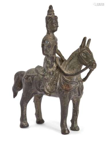 A Burmese bronze figure of a horse and rider, late 19th/earl...