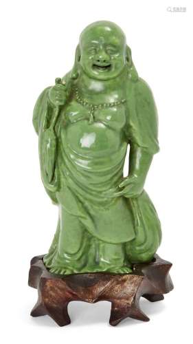 A Chinese pottery green-glazed figure of Budai, late 19th ce...