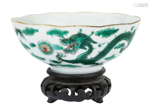 A Chinese green 'dragon' bowl, late 19th century, raised on ...