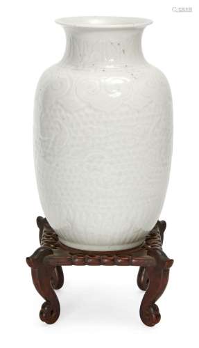 A Chinese white-glazed moulded vase, Republic period, decora...