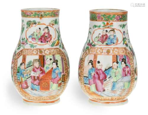 A pair of Chinese famille rose canton enamel porcelain vases...
