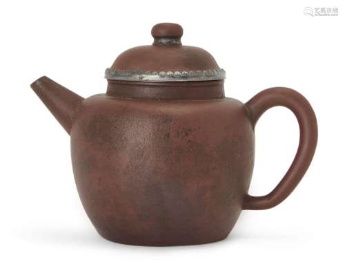 A Chinese Yixing purple clay teapot and cover, Wanli to Chon...