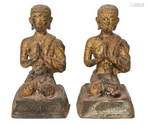 A pair of Thai bronze gilt lacquer disciples, 19th century, ...