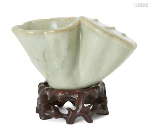 A Chinese celadon glazed 'lotus' water pot, 20th century, mo...