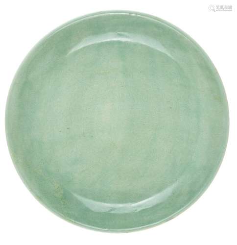 A large Chinese pale celadon charger, Republic period, incis...