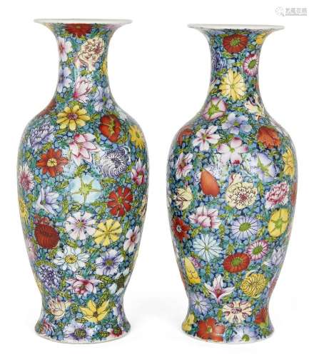 A pair of Chinese famille rose millefleur vases, Republic pe...