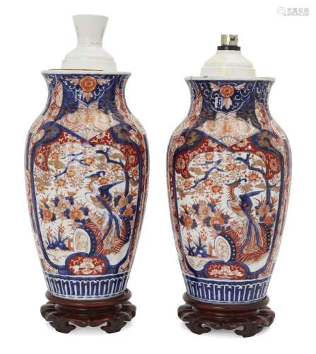 A pair of Japanese Imari vases, Meiji period, of ribbed balu...