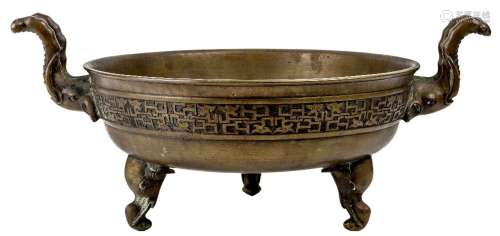 A large Chinese bronze 'elephant' tripod censer, 18th/19th c...
