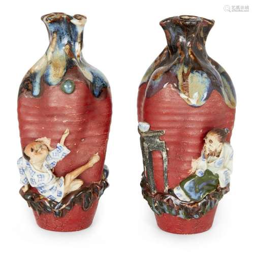 A pair of Japanese Sumida Gawa vases, Meiji period, each rib...