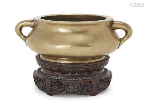 A Chinese bronze censer, 18th century, of circular bombé for...
