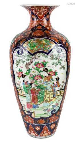 A massive Japanese Imari vase, 20th century, painted in fami...