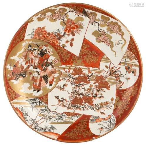 A Japanese Kutani charger, Meiji period, painted with seven ...