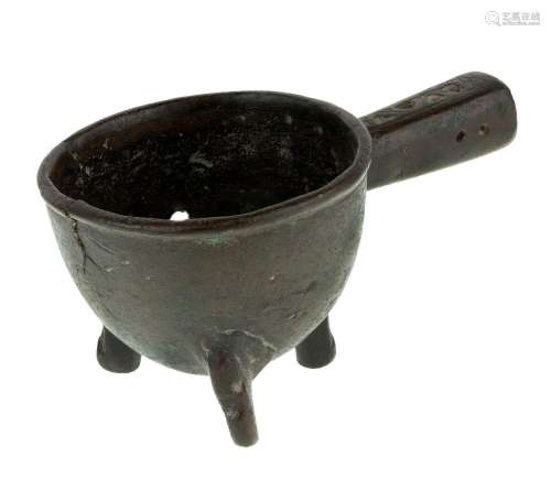 A Chinese bronze ladle, Ming dynasty, 16th century, the hand...