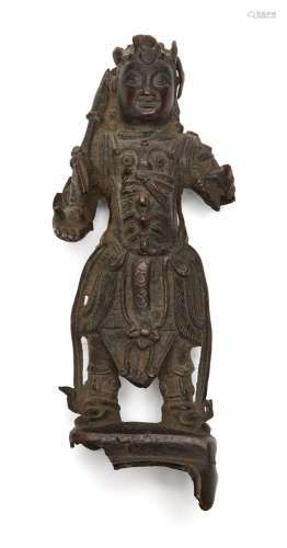 A Chinese bronze figure of a warrior, late Ming dynasty, sta...