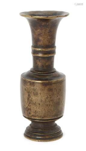 A Chinese bronze miniature long-necked baluster vase, 17th c...