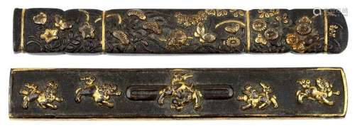 Two Japanese gilt bronze knife handles, 19th century, one wi...
