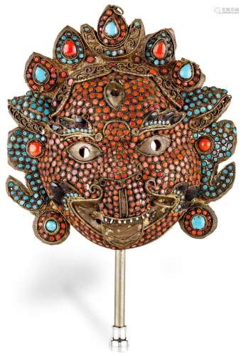 A Tibetan copper filigree and repoussé mask of Mahakala, 18t...