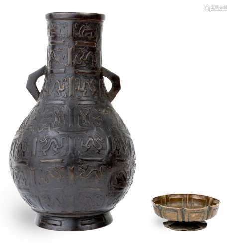 A Japanese twin handled bronze baluster vase, 19th century, ...