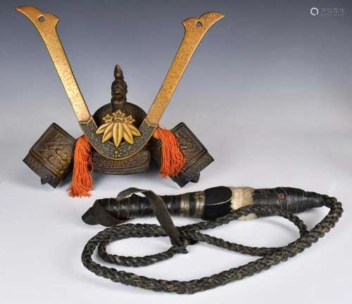 A Japanese Bronze Helmet & A Leather Whip