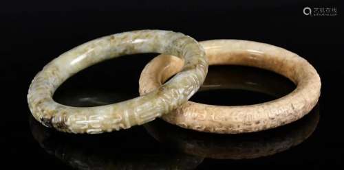 A Group of Two Jade Bangles 18thC