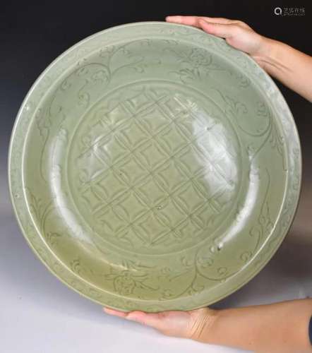 A Large Carved Longquan Celadon-Glazed Charger