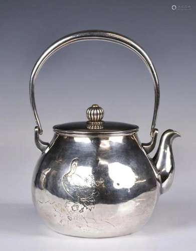 A Silver Engraved Tea Pot
