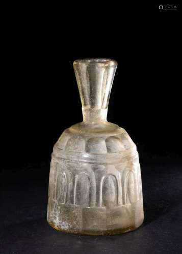 AN INTACT WHEEL-CUT CLEAR GLASS BOTTLE PROBABLY ABBASID, 9TH...