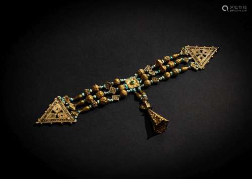 A THREE STAND FATIMID GOLD NECKLACE WITH SEMI PRECIOUS STONE...