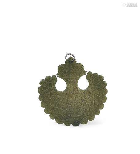 A CARVED JADE TALISMANIC PENDANT, 19TH CENTURY, QAJAR PERSIA