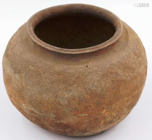 Eastern Han Dynasty fired clay jar, the wide body with incis...
