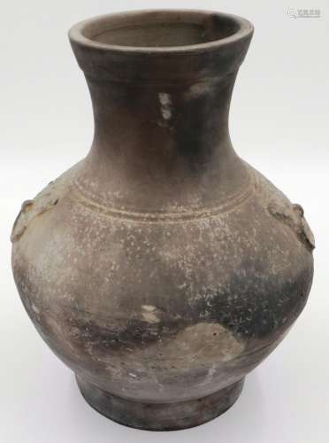 An early Qing Dynasty grey clay jar, baluster form with inte...