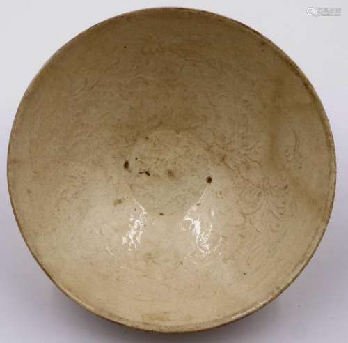 A Jin or Yuan Dynasty large porcelain bowl, decorated in rel...