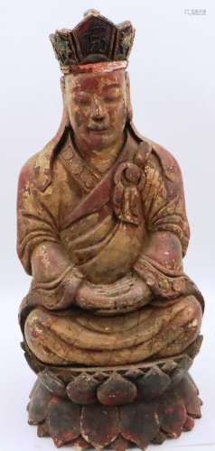 A large and rare Ming Dynasty gilt wood seated figure of a c...
